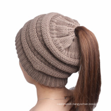 Women′s Soft Stretch Cable Knitted Messy High Bun Ponytail Cap Beanie Hat (HW131)